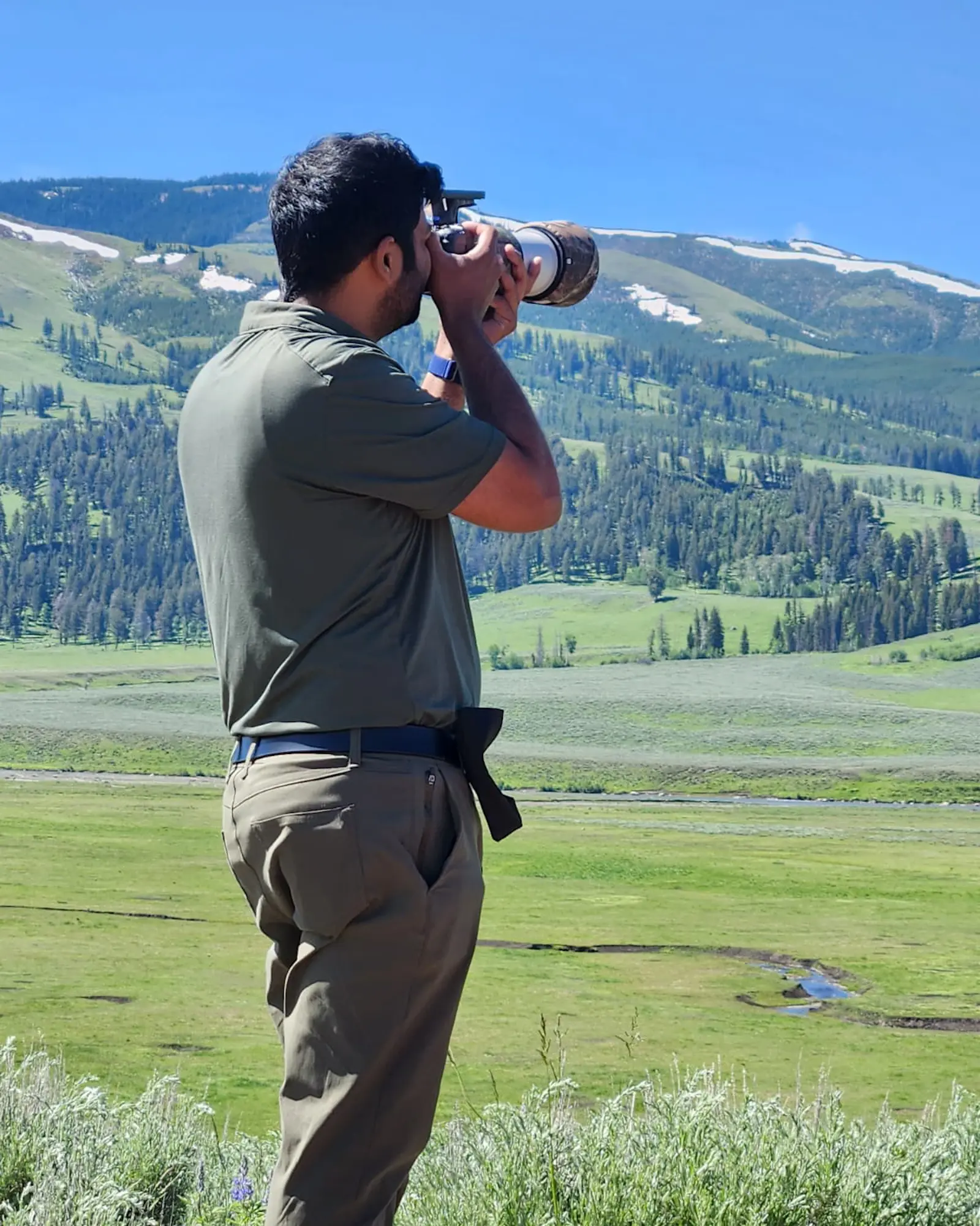 Muqeet Khan photographing wildlife in the field